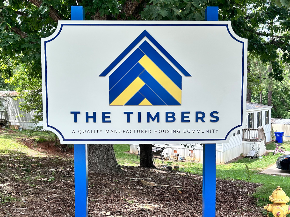 Freestanding entrance sign for The Timbers manufactured housing community