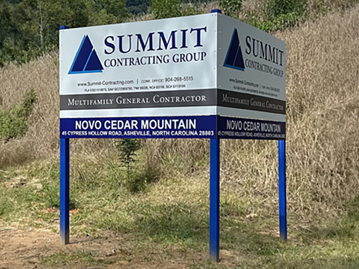 Freestanding construction site sign for Summit Contracting Group at Novo Cedar Mountain