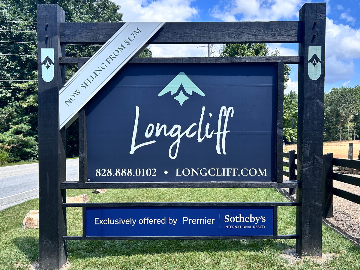 Large custom freestanding real estate sign for Longcliff with Longcliff and Premier Sotheby's branding