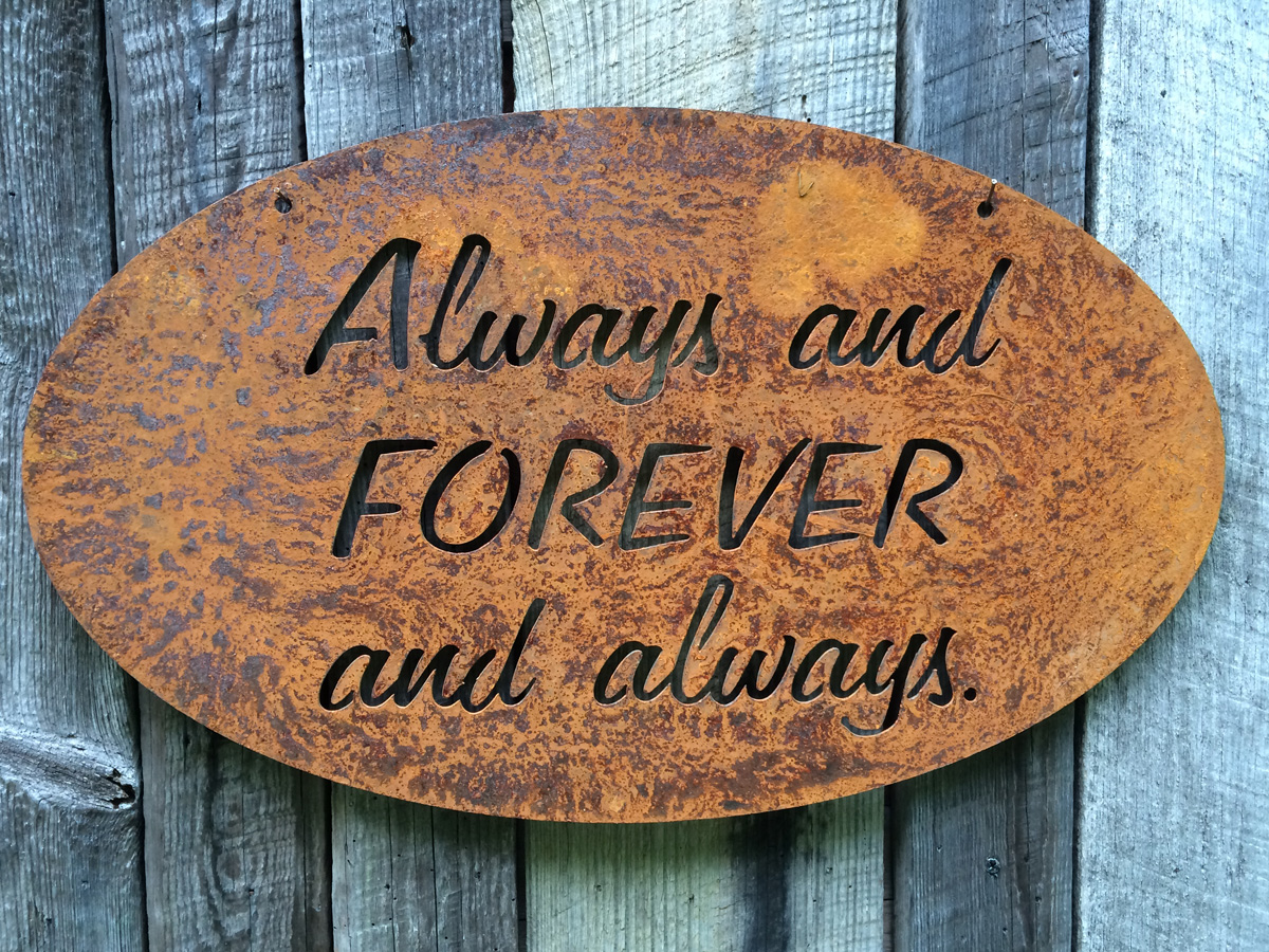 Oval steel Always and Forever and always sign with orange rust patina