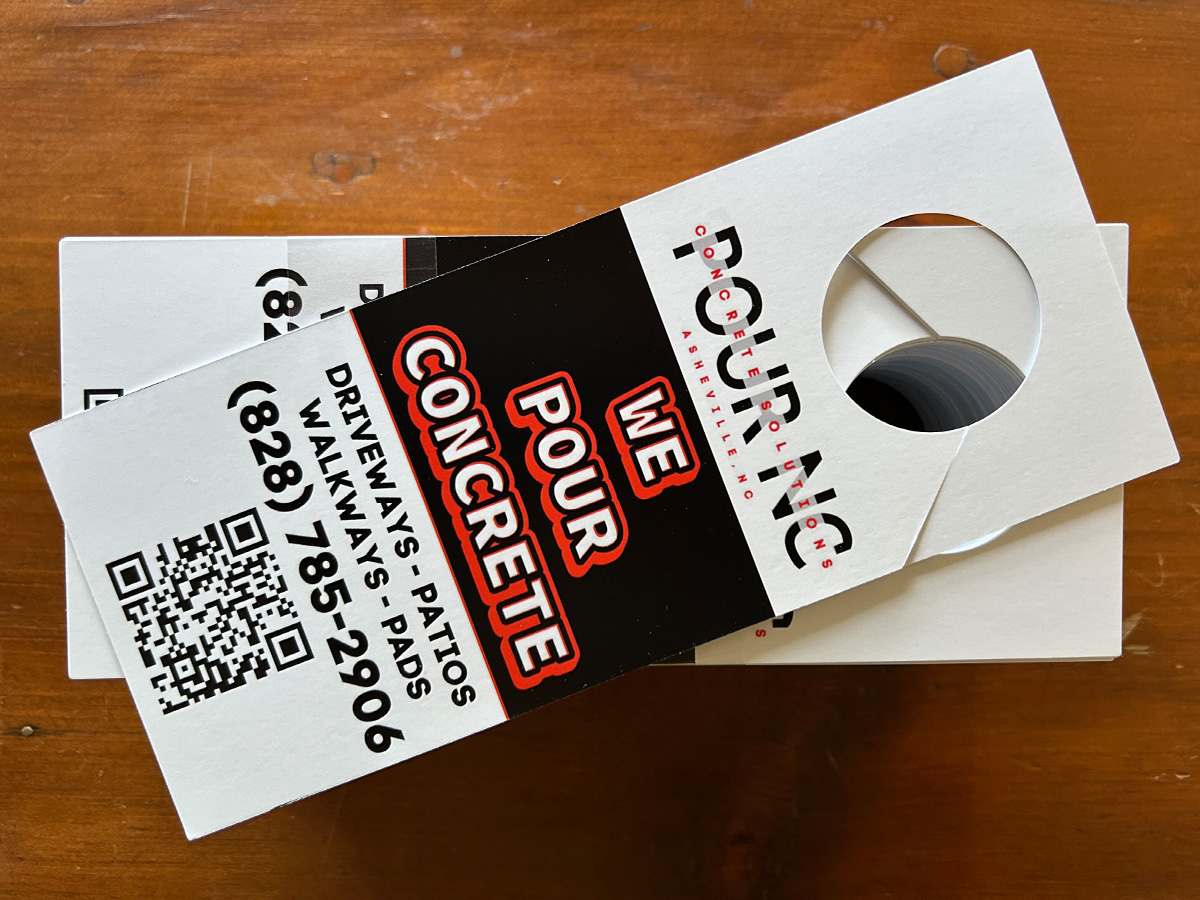 Custom Pouring Concrete Solutions door knob hangers with QR code and printed advertising