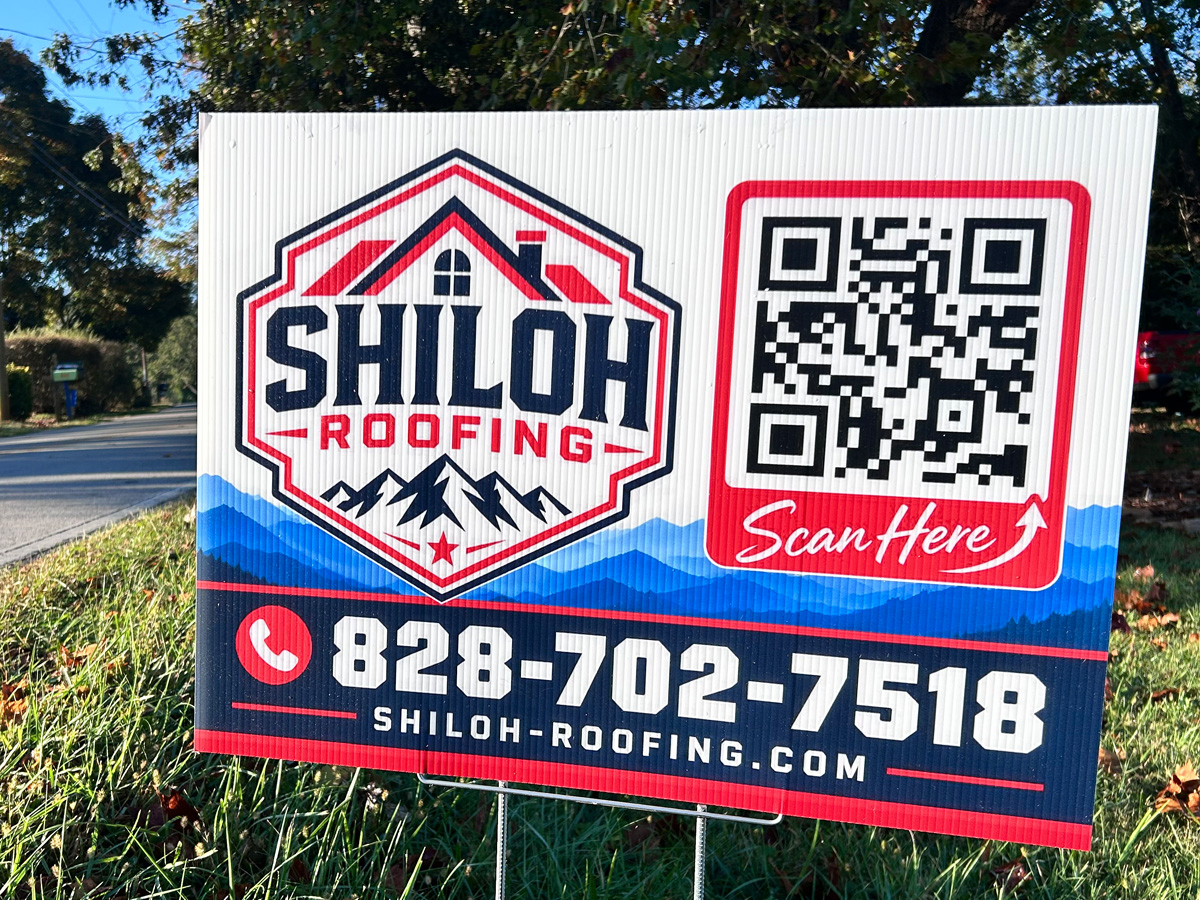 Full-color Shiloh Roofing corrugated plastic yard sign with QR code, installed on a wire H-stake